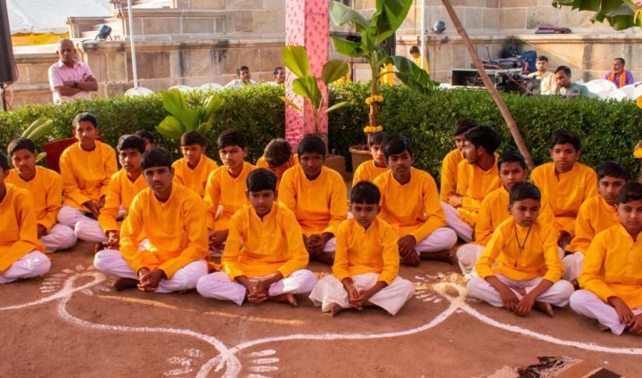 Students sitting together for traditional learning